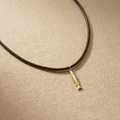 Golden Tide Sardine Necklace with petite gold fish pendant on leather cord