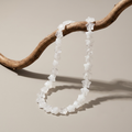Starfish Necklace with clear quartz star-shaped beads on neutral background