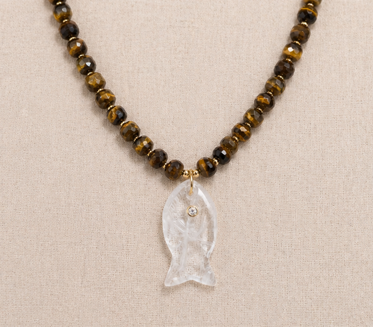Clear quartz fish pendant necklace with tiger’s eye beads and gold details