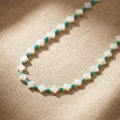 Mother of pearl clover necklace with teal accent beads