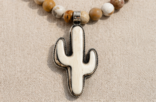 Close-up of fossil coral beads in Sundown Fossil Necklace showing natural texture